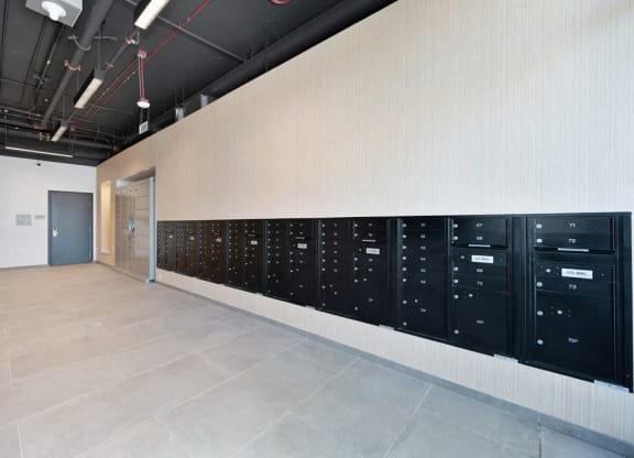 a large room with a row of lockers on the wall