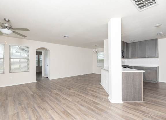 Living And Kitchen View at The Village at Caney Mills, Conroe, Texas