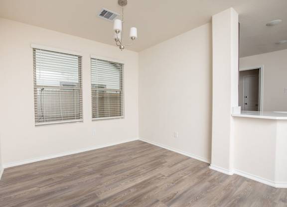 Living Area With Windows at The Village at Caney Mills, Conroe