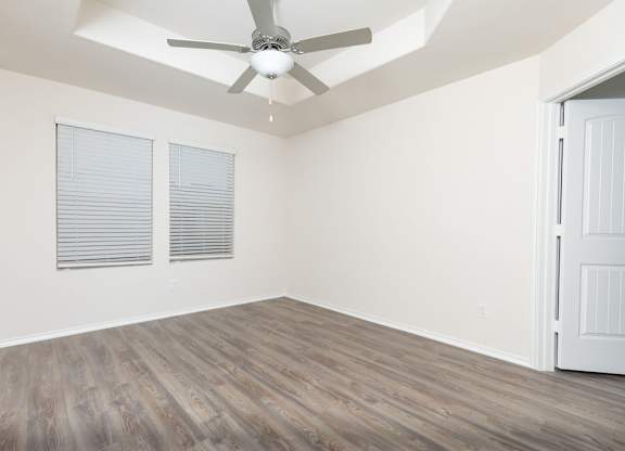 Wood Floor Living Room at The Village at Caney Mills, Texas, 77303