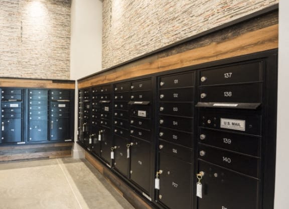 the lockers in the basement of the building are lined up against a wall with