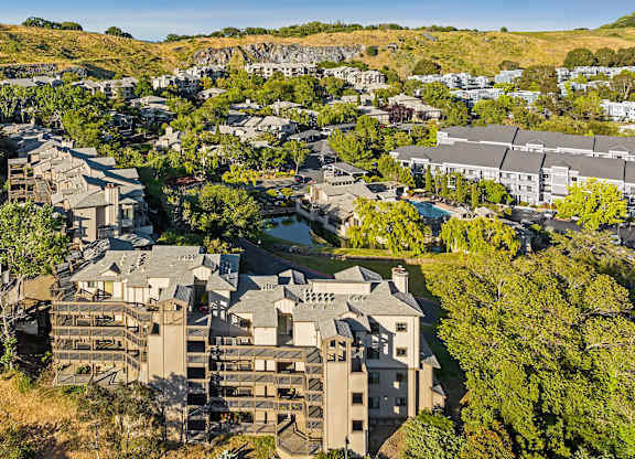 a aerial view of a city with buildings and trees