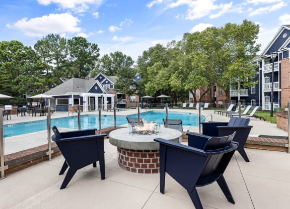 the preserve at ballantyne commons pool and patio with chairs and fire pit at Mariners Crossing, North Carolina, 27612