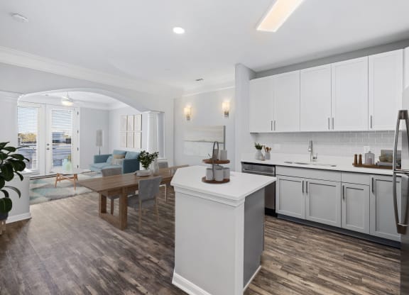 a kitchen and dining area in a 555 waverly unit