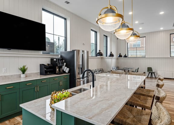 Clubroom Kitchen with quarts countertops and raised island