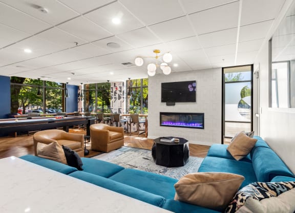 a living room with a blue couch