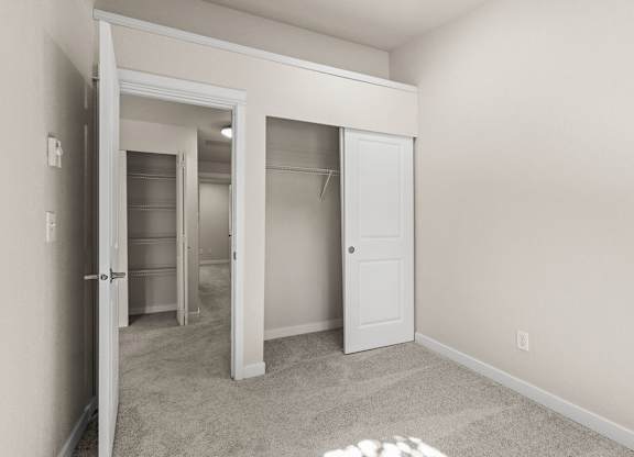 Bedroom with walk-in closet and storage space at Hidden River Townhomes Apartments, Kirkland, 98034