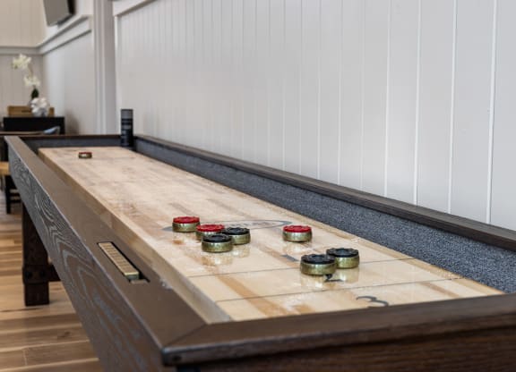 Clubroom shuffle board table closeup shot