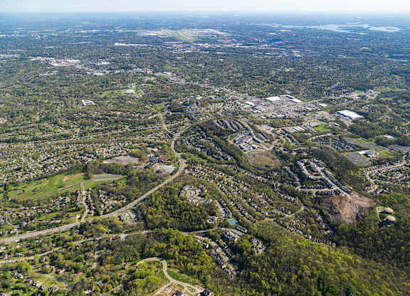 Gallery slide 40 of 42 - a aerial view of a neighborhood with houses and trees