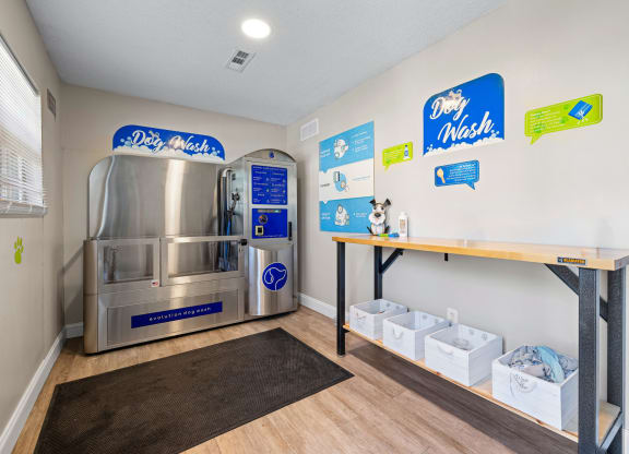 a room with a refrigerator and a counter with boxes of groceries at View at Lake Lynn, Raleigh, NC 27613
