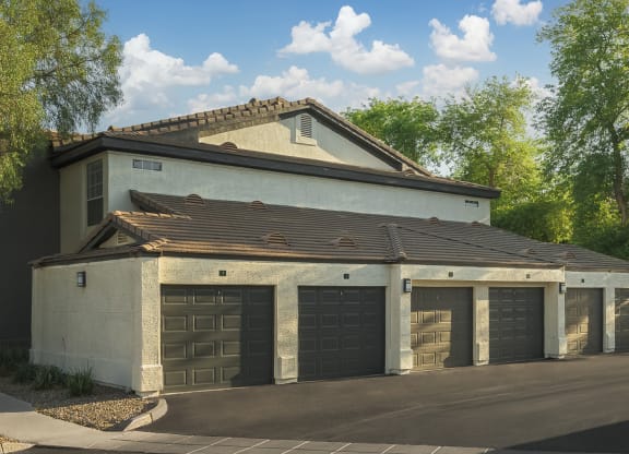a row of garage doors on the side of a building