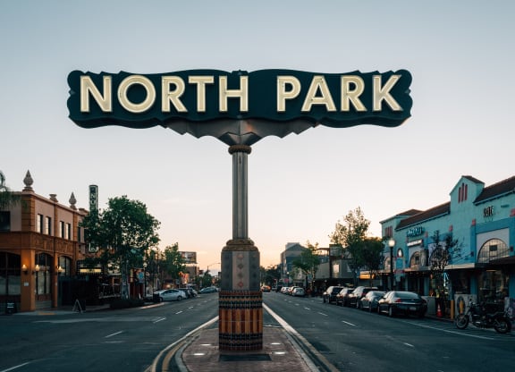 a sign for north park on a city street