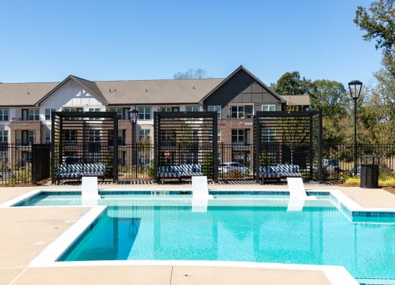 the swimming pool at the falls at rolland park apartments