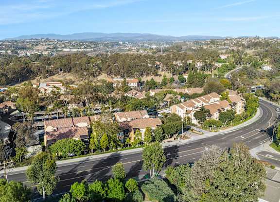 A residential area with houses and trees.