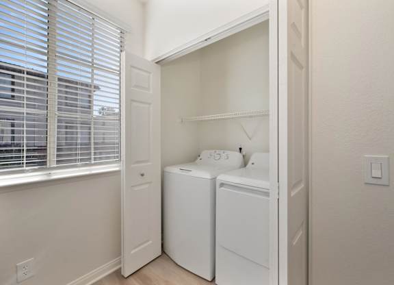 Laundry room at The Missions at Rio Vista Apartments