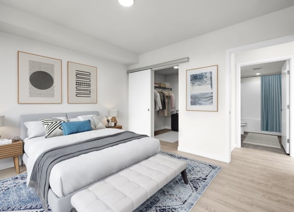 a bedroom with a bed and a mirror at Ion Town Center, Shoreline, WA 98133