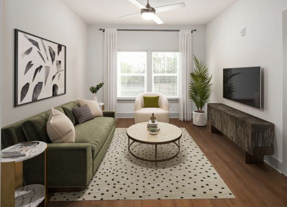 a living room with a green couch and a coffee table
