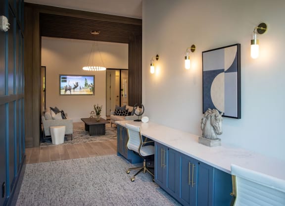 a living room with blue cabinets and a white counter top