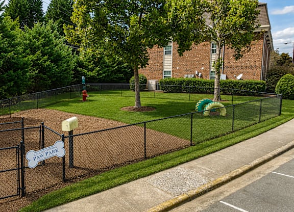 A playground with a sign that says "PLAY PARK".
