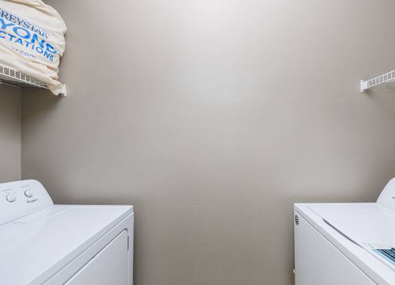 a washer and dryer in a laundry room at Clear Creek Meadows Apartments, Copperas Cove, 76522