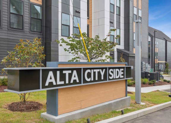 a sign side in front of a building