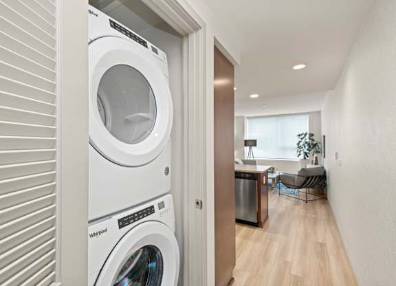 a washer and dryer in a laundry room in a 555 waverly unit