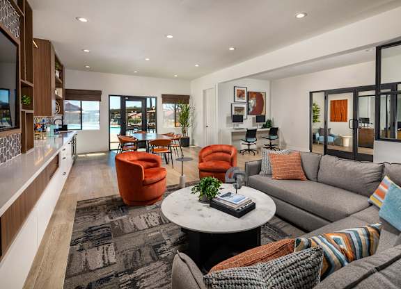 Clubhouse with couches and chairs and a table at Bella Terra, Vista, Vista, California, 92081