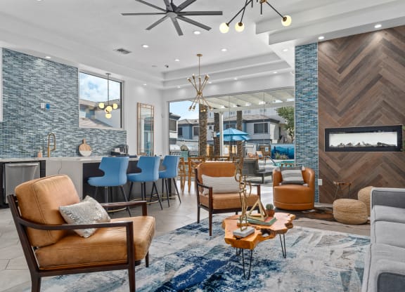a living room filled with furniture and a fire place