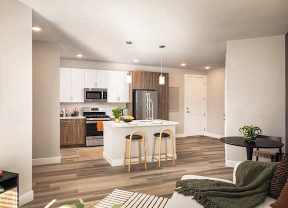 Open concept kitchen with island at The Allaso Peak, Colorado Springs