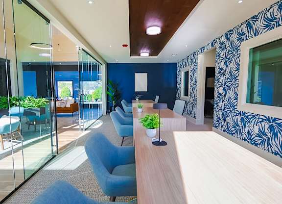 Office area with blue chair at The Madison at Adams Farm, Greensboro, 27407