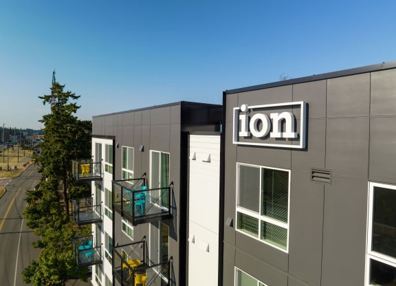 a picture of the lion building with a blue sky in the background at Ion Town Center, Washington, 98133