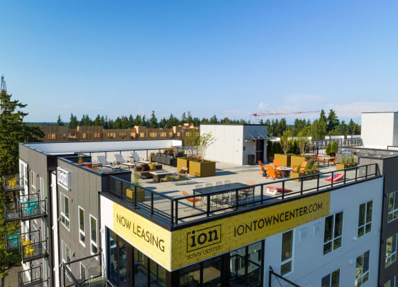 a view from the top of a building of a construction site with a crane in the background at Ion Town Center, Washington