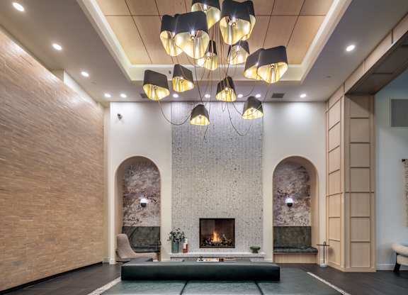 a living room with a fireplace and a couch