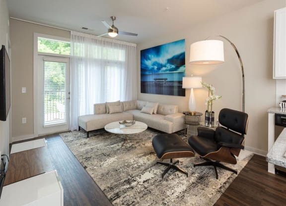 a living room with a couch and a chair