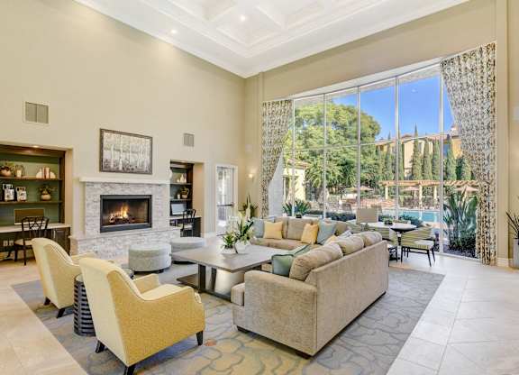 Clubhouse with a fireplace and a couch.