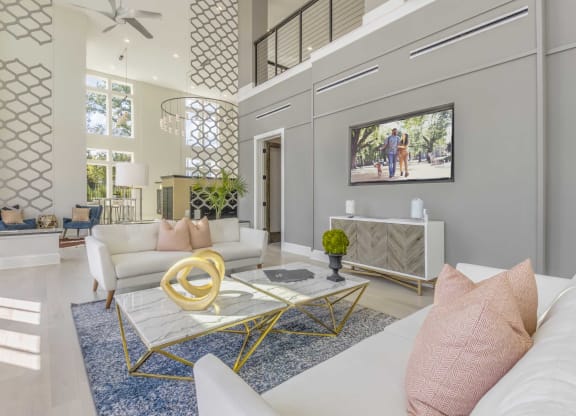 a living room with couches and a coffee table