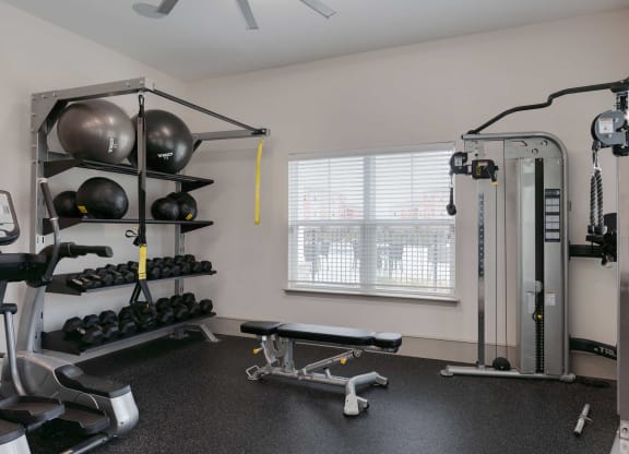 the gym at the flats at big tex apartments