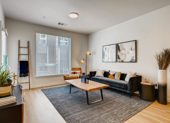 a living room with a couch and a coffee table