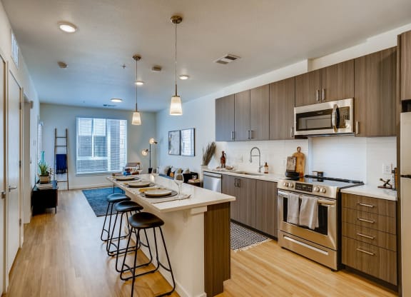 spacious kitchen with stainless steel appliances at the flats at obsidian