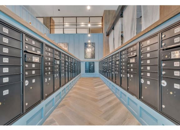 the lockers are lined up in a long room with wood floors