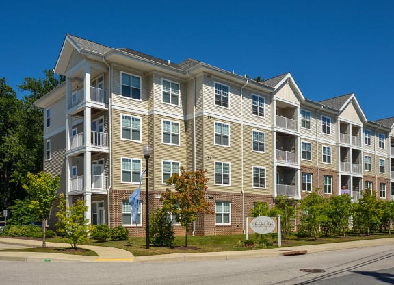 an apartment building on the corner of a street