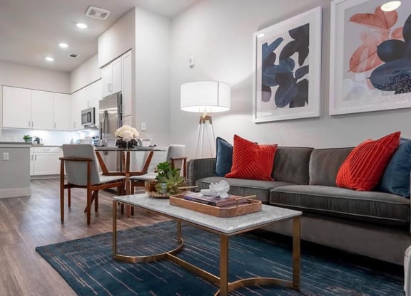 a living room with a couch and a table