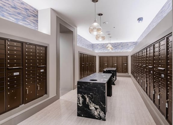 a wine cellar with lockers and a marble table