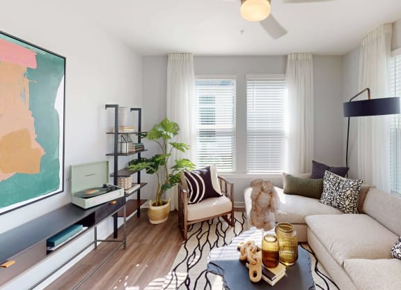 a living room with a couch and a tv