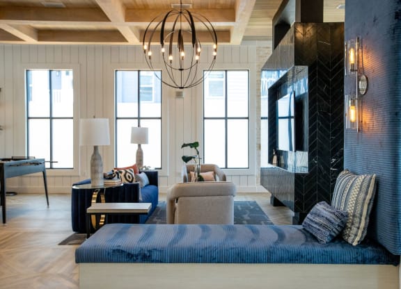 a living room with a couch and a fireplace