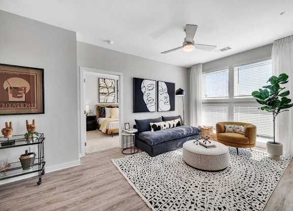 a living room with a couch and a table