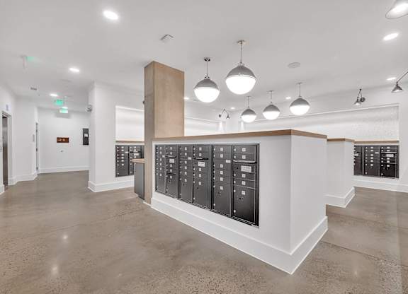 the renovated tasting room has a wall of wine racks and a large display of wines