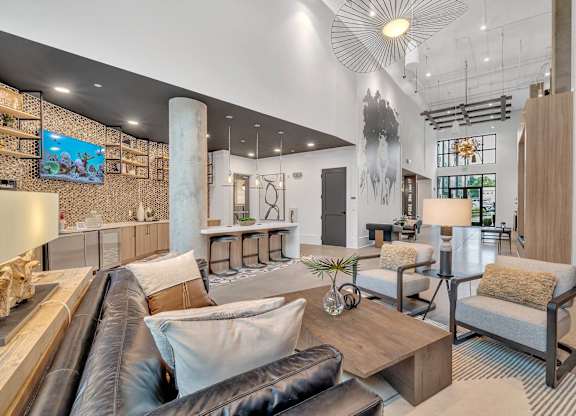 a living room with a couch and a table