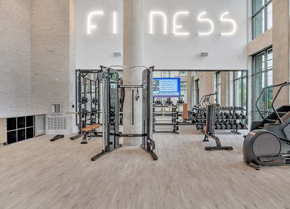 the gym at the flats at big tex apartments