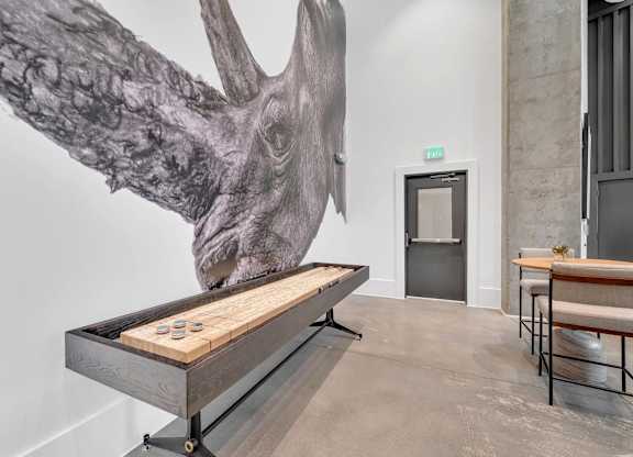 a foosball table in a room with a large